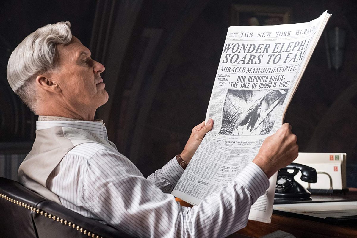 man reads newspaper
