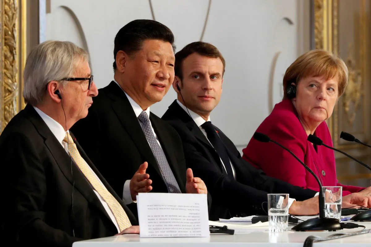 French President Emmanuel Macron, Chinese leader Xi Jinping, German Chancellor Angela Merkel and European Commission President Jean-Claude Juncker hold a news conference at the Elysee presidential palace in Paris on March 26, 2019. (Thibault Camus/Pool via Reuters)