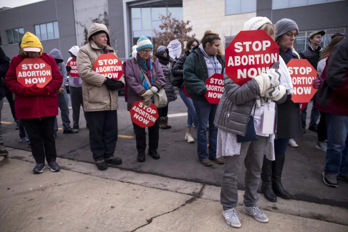 Demonstrators gather during a protest vigil on Jan. 17, 2019, in Washington. (Zach Gibson/Getty Images)