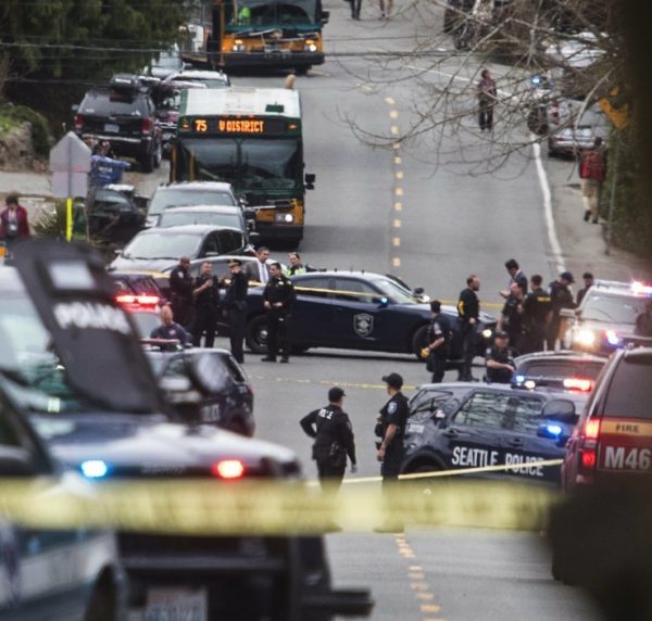 investigators on the scene of a shooting in Seattle
