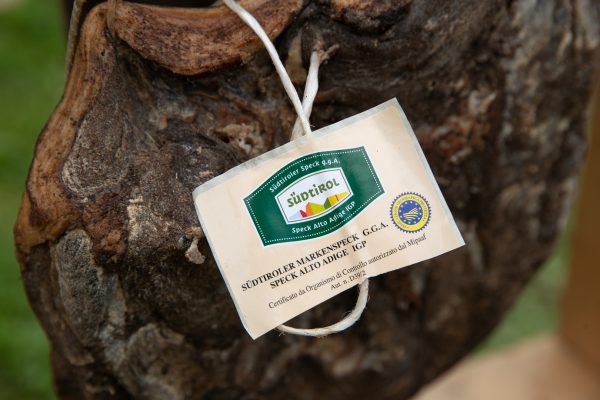Authentic label and PGI seal on Italian speck