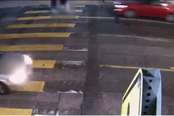 car speeding towards pedestrians