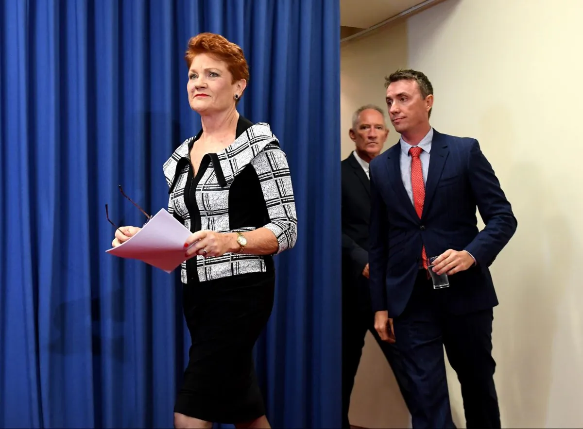 One Nation Leader Pauline Hanson (L) arrives at a press conference together with James Ashby (far R) and Steve Dickson (centre R) in Brisbane, Australia, on March 28, 2019. (Bradley Kanaris/Getty Images)