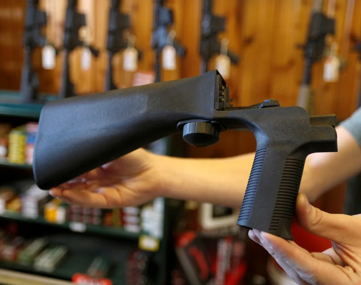 A bump fire stock that attaches to a semi-automatic rifle to increase the firing rate is seen at Good Guys Gun Shop in Orem, Utah, Oct. 4, 2017. REUTERS/George Frey/File Photo