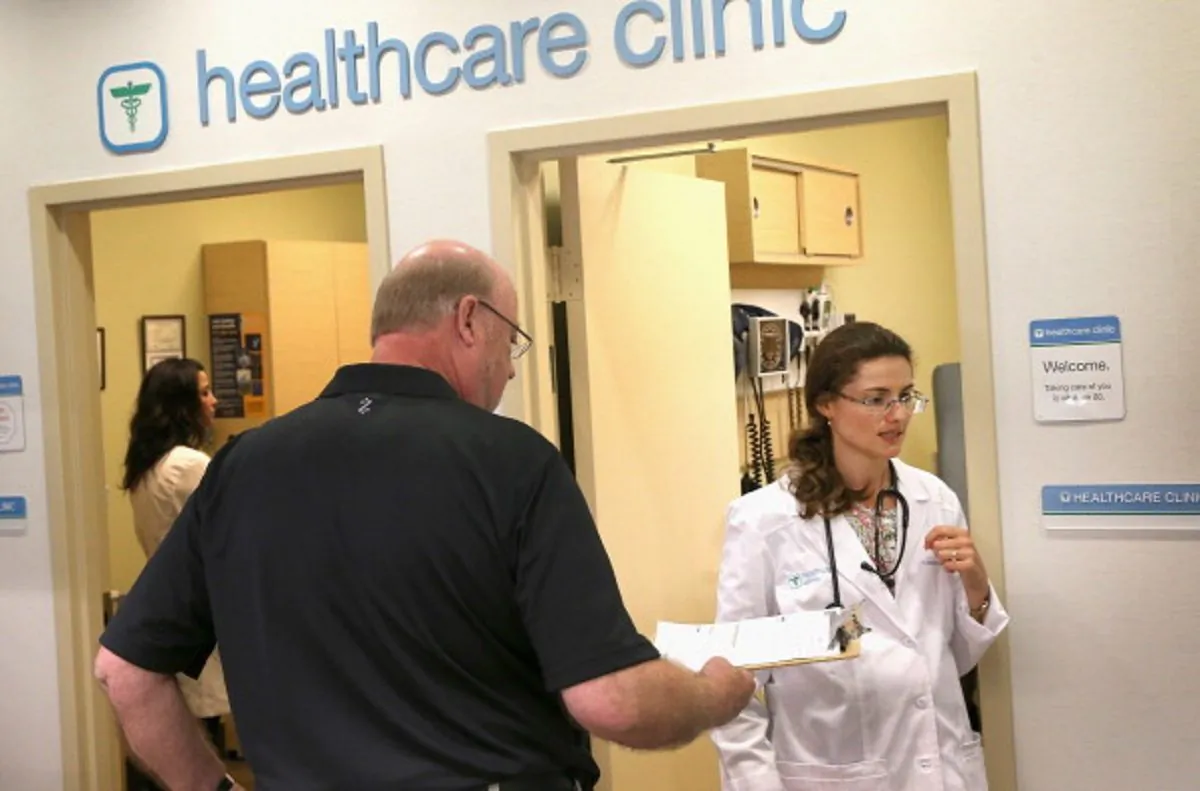 A male gives his health information to nurse practitioner before getting a flu vaccine at a Walgreens healthcare clinic in Wheeling, Ill. on Sept. 19, 2013. (Scott Olson/Getty Images)