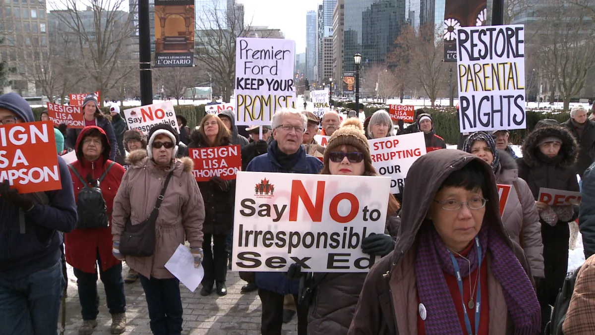 People gather to call on Premier Doug Ford to keep his promise to repeal the controversial 2015 sex education curriculum and for Education Minister Lisa Thompson to resign at Queen’s Park in Toronto on Feb. 2, 2019. (NTD Television)