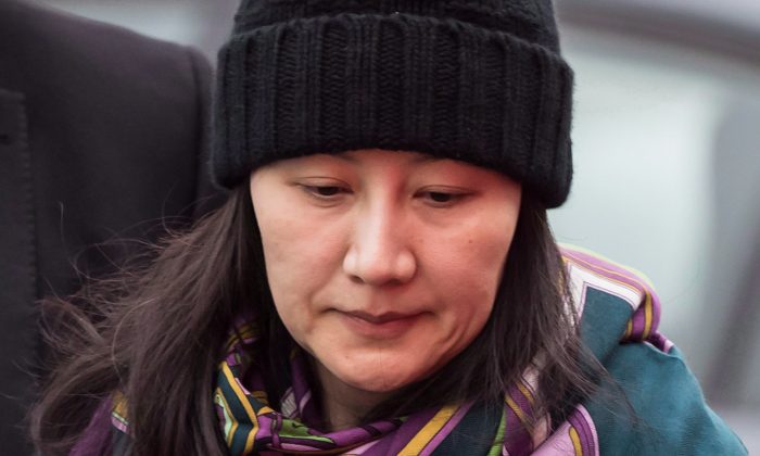 Huawei chief financial officer Meng Wanzhou arrives at a parole office, in Vancouver on Dec. 12, 2018. On April 3, The U.S. Senate Foreign Relations Committee is set to discuss a resolution commending the Canadian government for upholding the rule of law in Meng's arrest. (The Canadian Press/Darryl Dyck)