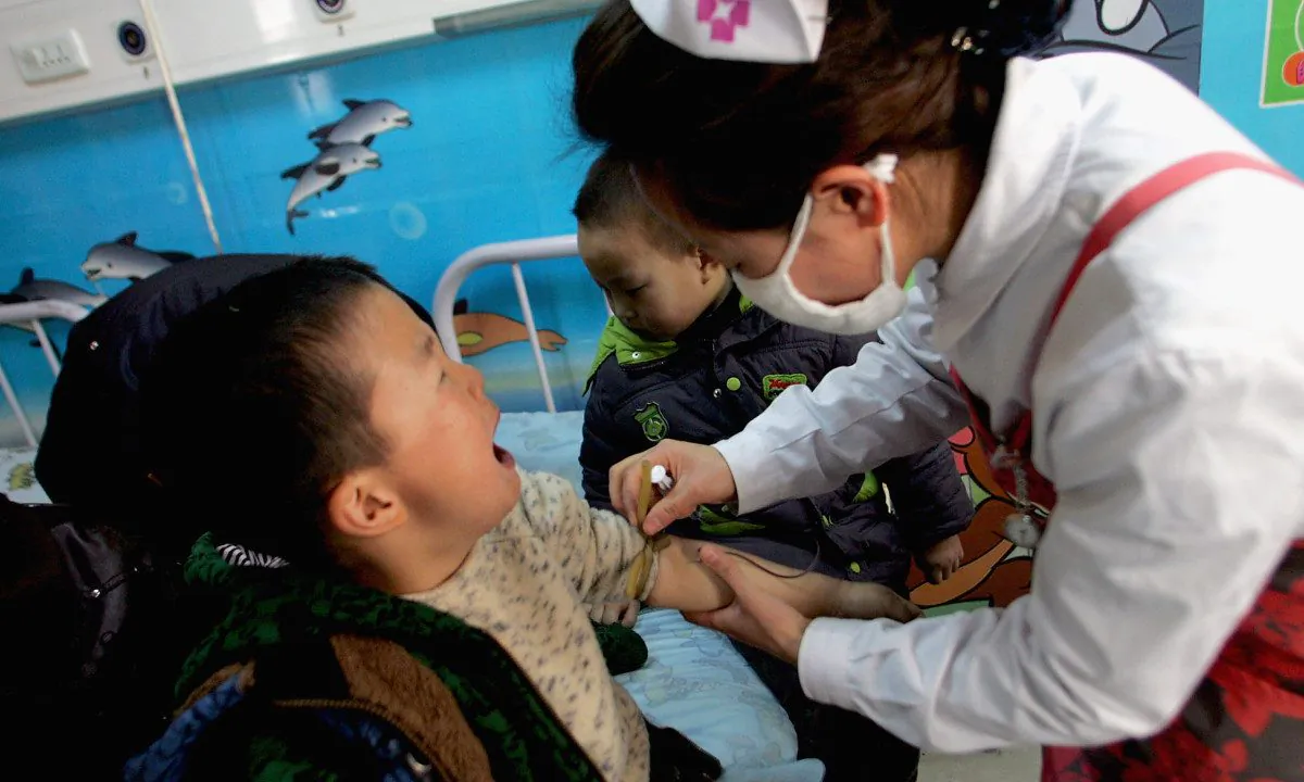 A child, supposedly poisoned by nitrite, receives treatment in Xi'an, Shaanxi Province, China. (VCG/VCG via Getty Images)