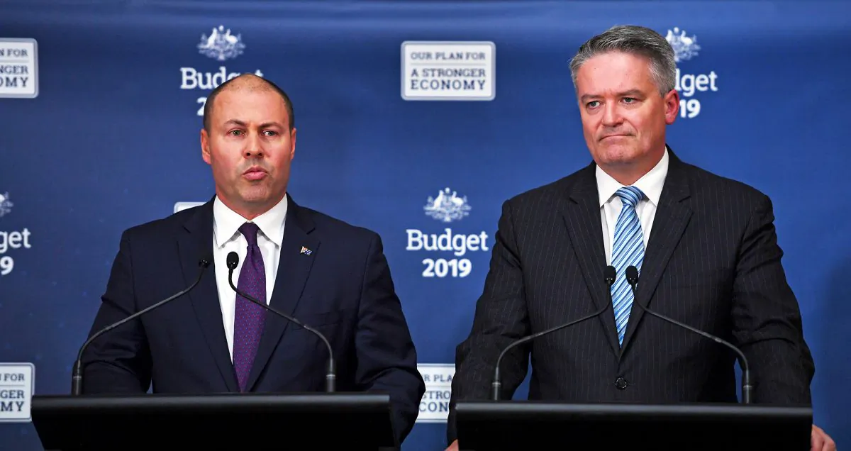 Australian Treasurer Josh Frydenberg (L) and Finance Minister Mathias Cormann (R) announce the Federal Budget in Canberra, Australia, on April 2, 2019. (Tracey Nearmy/Getty Images)
