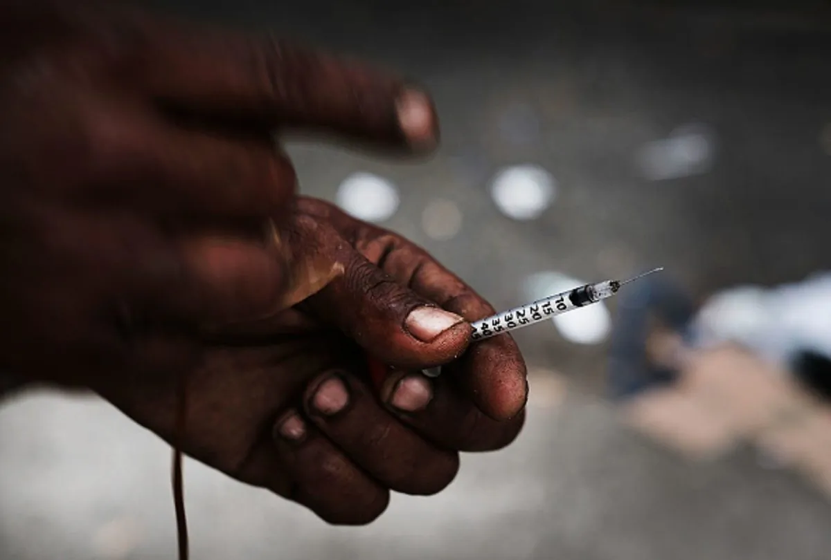 A heroin user displays a needle in a South Bronx neighborhood that has the highest rate of heroin-involved overdose deaths in New York City, on Oct. 6, 2017. (Spencer Platt/Getty Images)