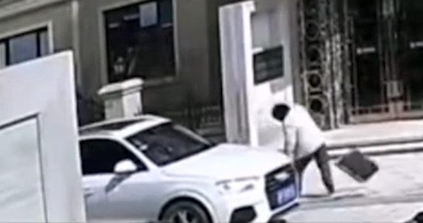 Woman hit by car and beat