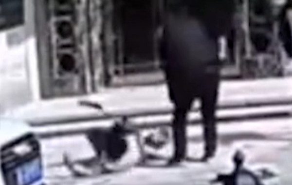 Woman hit by car and beat
