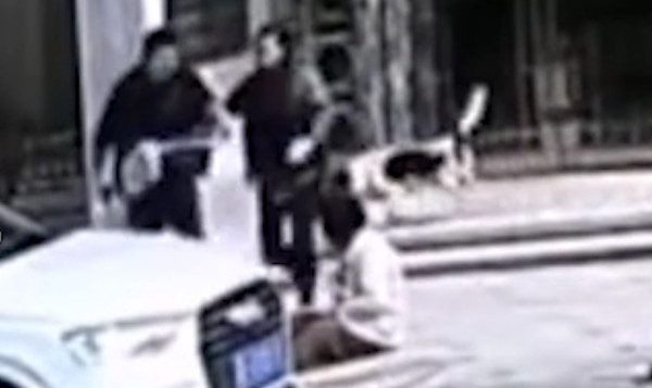 Woman hit by car and beat