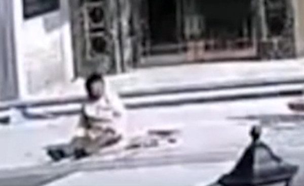 Woman hit by car and beat