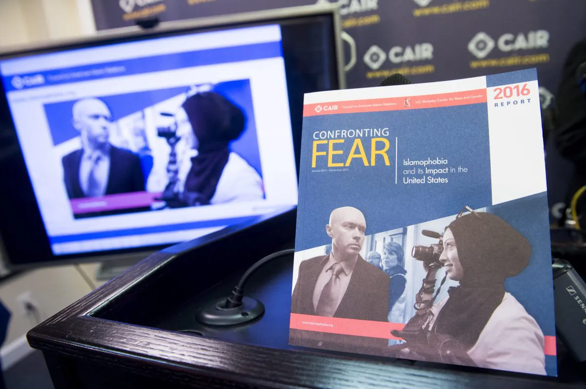 A report titled "Confronting Fear," about Islamophobia in the United States released by the Council on American-Islamic Relations (CAIR), is seen at their headquarters in Washington, DC, June 20, 2016. (SAUL LOEB/AFP/Getty Images)
