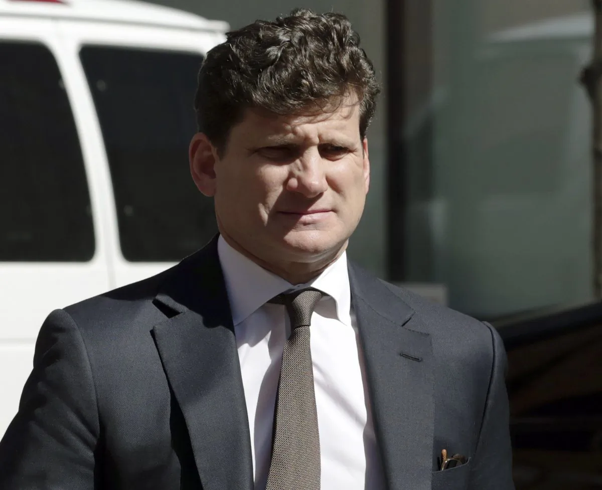 Gordon Caplan arrives at federal court in Boston on April 3, 2019. (Charles Krupa/Photo via AP)