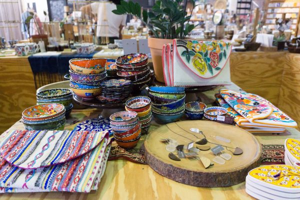 Colorful dishware and purses at Seed Peoples Market