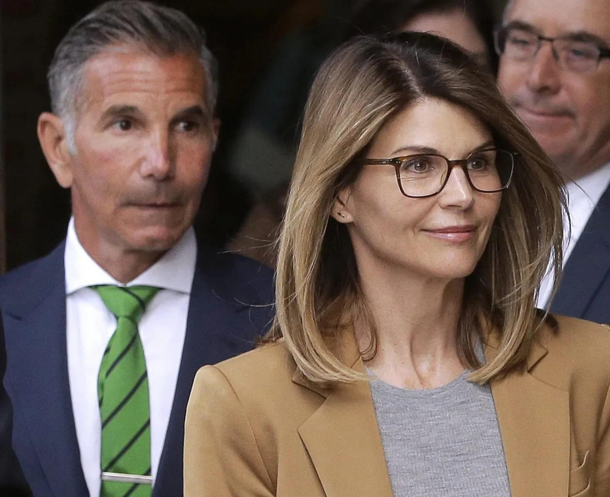 Actress Lori Loughlin and husband, clothing designer Mossimo Giannulli, depart federal court in Boston on April 3, 2019. (Steven Senne/AP Photo)