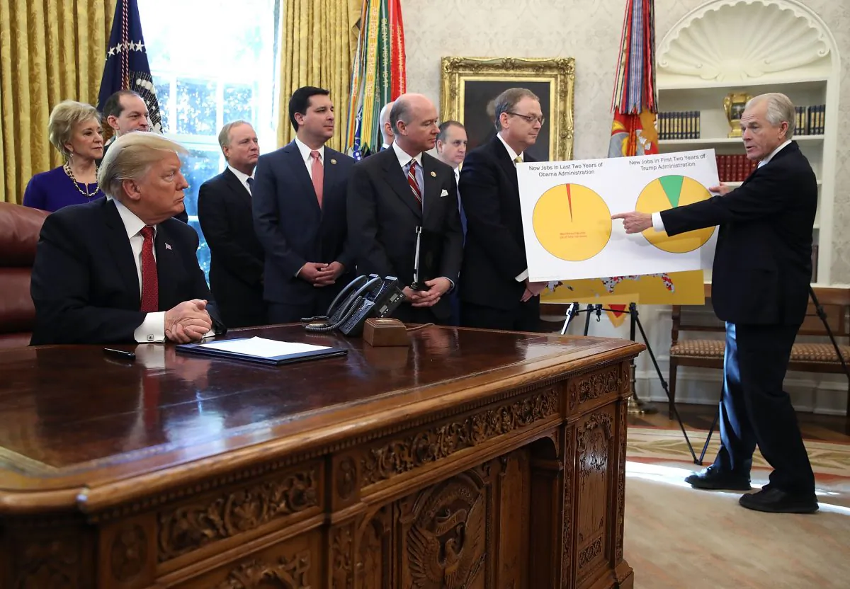 President Donald Trump listens to Peter Navarro (R), Assistant to the President for Trade & Manufacturing, speak in the Oval Office in Washington on Jan. 31, 2019. (Mark Wilson/Getty Images)