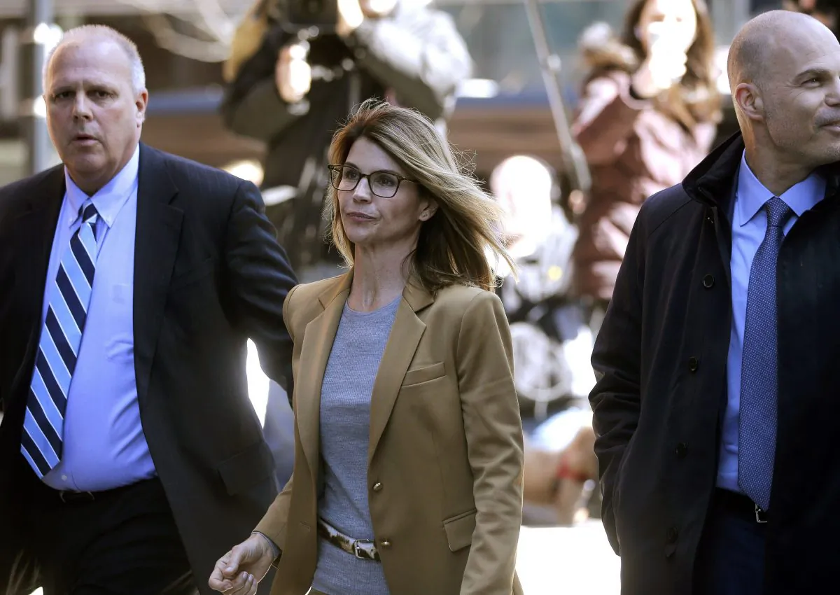 Actress Lori Loughlin arrives at federal court in Boston on April 3, 2019. (Charles Krupa/Photo via AP)