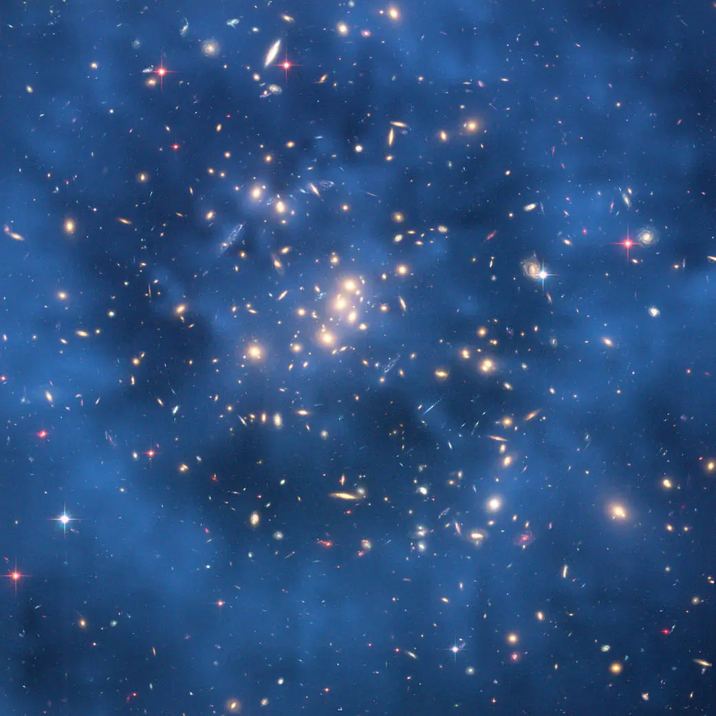 Dark matter is said to be the dark ring produced in the above photo after two galaxies collide.
(NASA, ESA, M. J. Jee and H. Ford et al. (Johns Hopkins Univ.) )