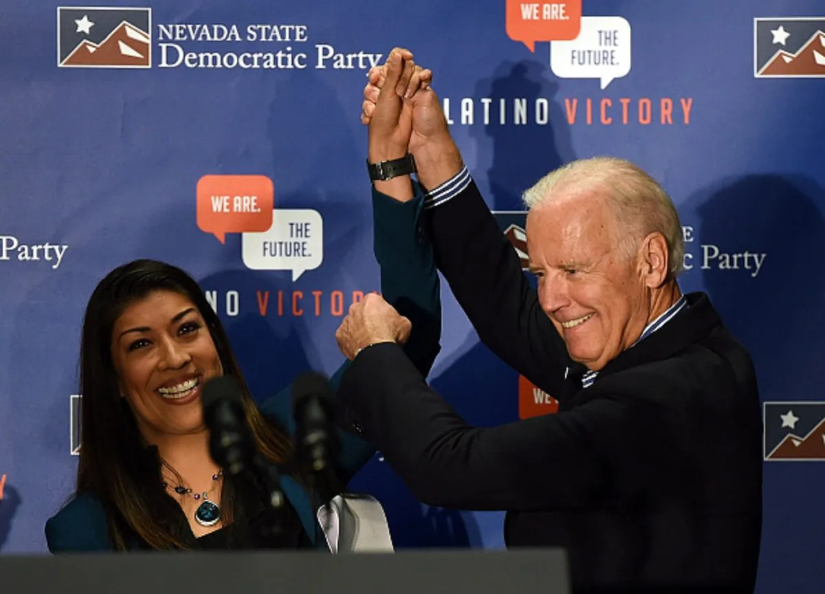 Democratic candidate for lieutenant governor and current Nevada Assemblywoman Lucy Flores (D-Las Vegas) (L) introduces U.S. Vice President Joe Biden at a get-out-the-vote rally at a union hall in Las Vegas, Nevada, on Nov. 1, 2014. (Ethan Miller/Getty Images)
