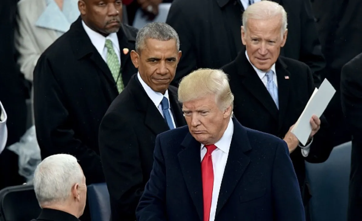 President Donald Trump (2nd-R) with Vice President Mike Pence (L) as former President Barack Obama and former Vice President Joe Biden (R) look on during Trump's inauguration ceremonies at the US Capitol in Washington, on Jan. 20, 2017. (Paul J. Richards/AFP/Getty Images)