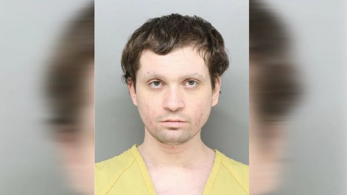 This undated photo provided by the Hamilton County Sheriff's Office in Cincinnati shows Brian Rini.  (Hamilton County Sheriff's Office via AP)