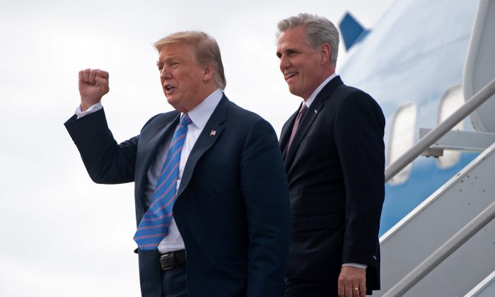 President Donald Trump and House Republican Leader Kevin McCarthy (R-Calif.) disembark from Air Force One upon arrival at Los Angeles International Airport in Los Angeles, Calif., on April 5, 2019. (Saul Loeb/AFP/Getty Images)