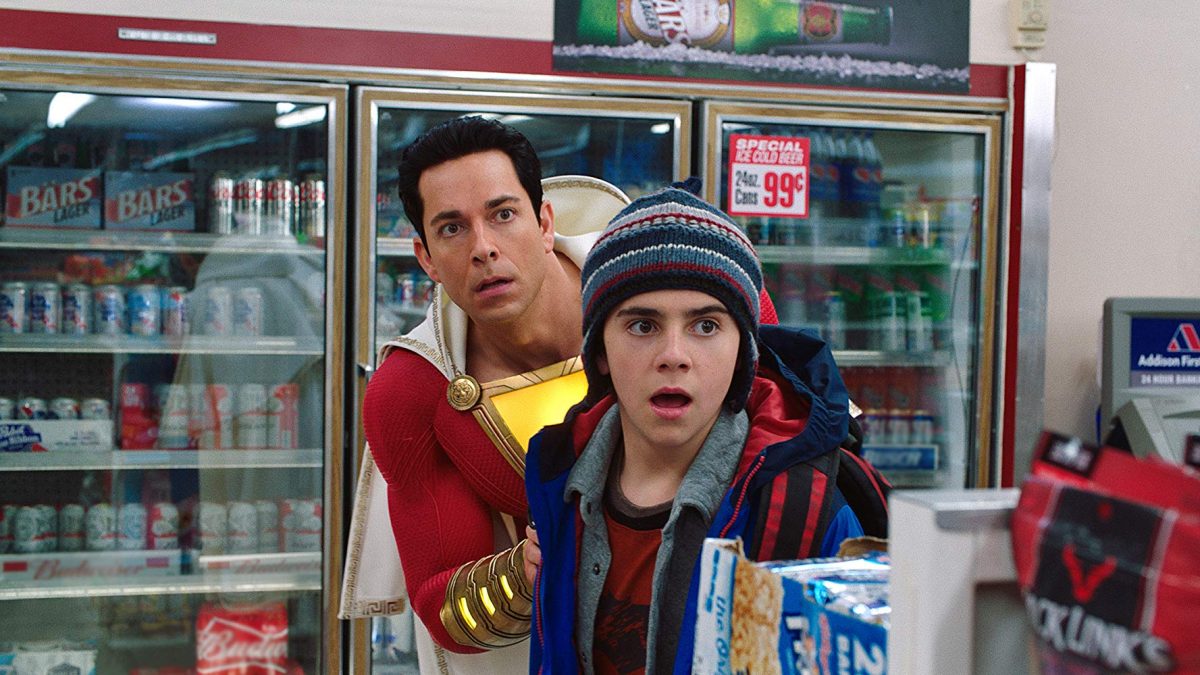 superhero and boy in convenient store