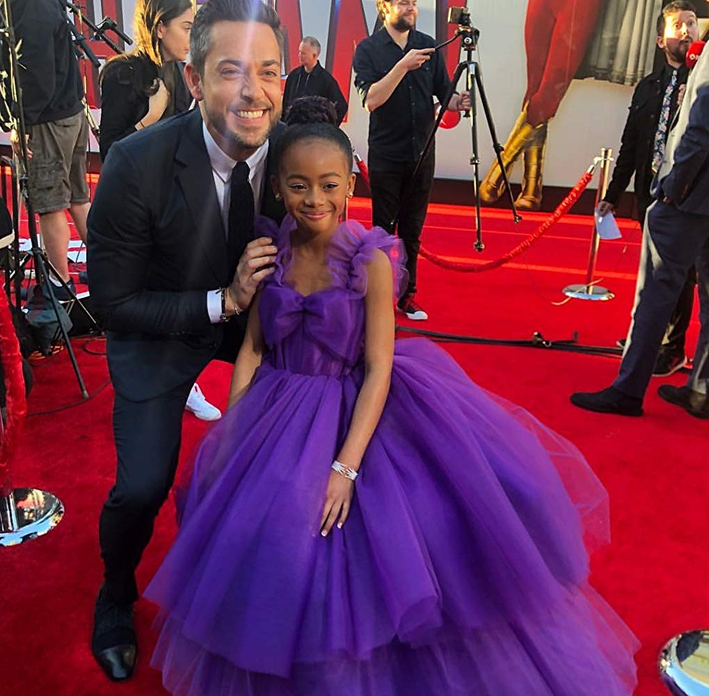 White man and black girl purple dress