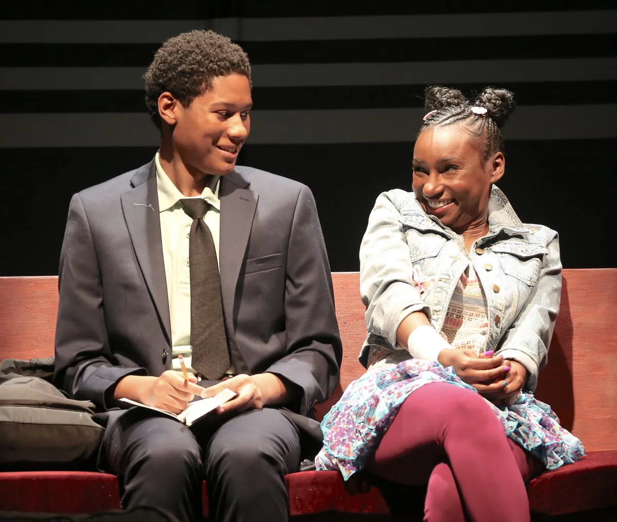 The two 12-year-olds Tino and Deja are played by the young adults Jay Mazyck and Courtney Thomas in “Surely Goodness and Mercy.” (Carol Rosegg)