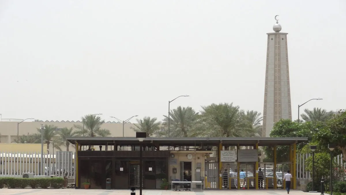 A mosque is seen behind the entrance gate to the administration area
of Saudi Aramco headquarters, on May 10, 2016 in Dhahran, 400kms east of the capital Riyadh.
Despite collapsed global oil prices, production is expanding at Shaybah, as it is in other units of the company at the centre of the kingdom's Vision 2030 drive for diversification away from oil. The Saudi government plans to sell less than five percent of the company in what officials say will be the world's largest-ever share offering, while transforming Saudi Aramco into "a global industrial conglomerate". By 2020 the company says it will have tripled its gas processing capacity from levels at the turn of the century.
 / AFP / IAN TIMBERLAKE        (Photo credit should read IAN TIMBERLAKE/AFP/Getty Images)