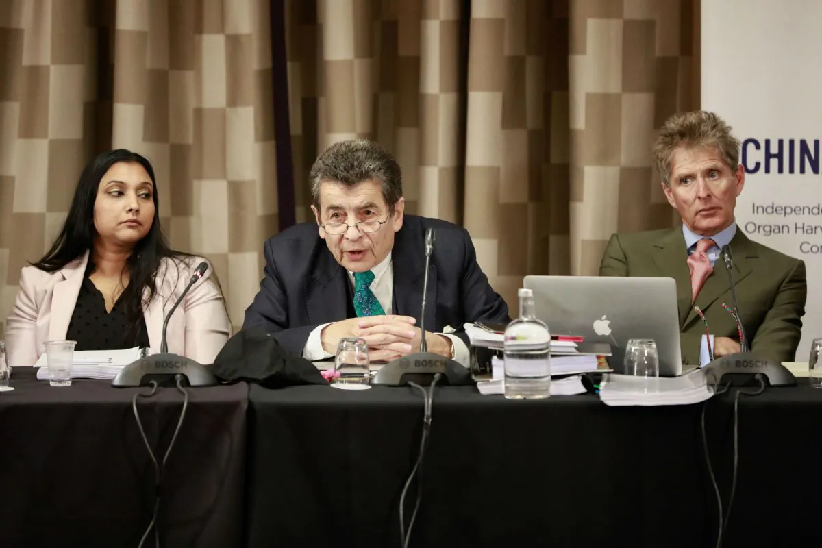 Tribunal panel member Regina Paulose (L), chair to the tribunal Sir Geoffrey Nice QC (C), and panel member  Nicholas Vetch on the first day of the April hearings in London on April 6, 2019. (endtransplantabuse.org)