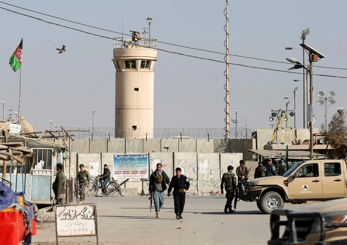 Afghan National Army (ANA) soldiers and police keep watch outside the Bagram Airfield entrance gate north of Kabul, Afghanistan on Nov. 12, 2016. (Omar Sobhani/Reuters)