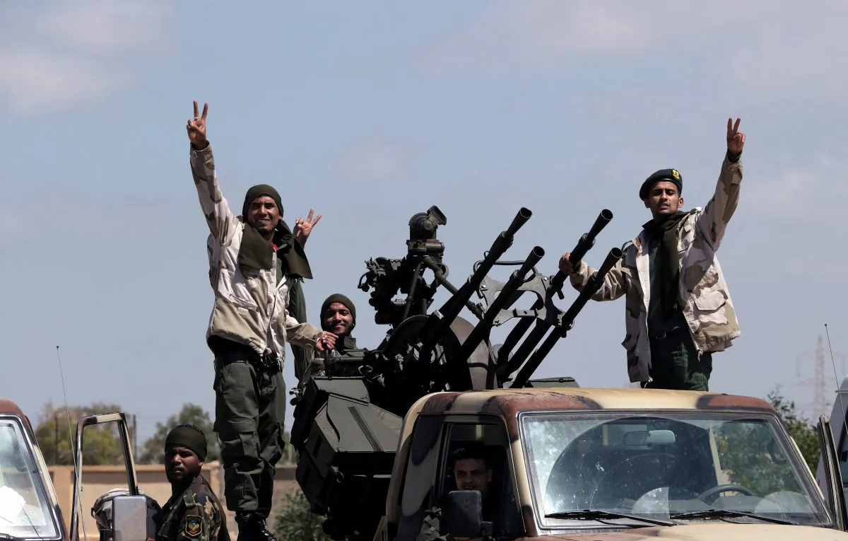 Libyan National Army (LNA) members, commanded by Khalifa Haftar, head out of Benghazi to reinforce the troops advancing to Tripoli, in Benghazi, Libya April 7, 2019. REUTERS/Esam Omran Al-Fetori