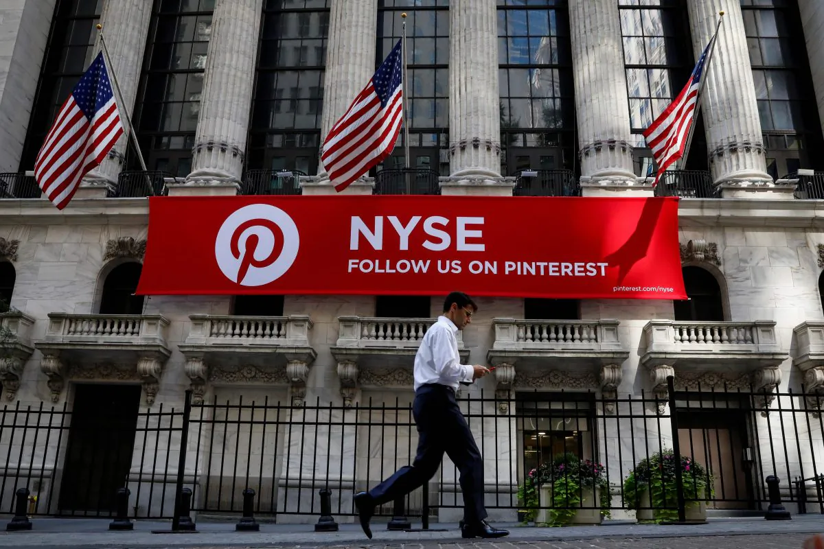 FILE PHOTO: A Pinterest banner hangs on the facade of the New York Stock Exchange (NYSE) in New York City, U.S., September 22, 2017. REUTERS/Brendan McDermid/File Photo