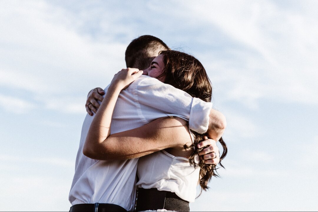 Hugs have a biochemical impact that lasts longer than the embrace. (Priscilla Du Preez/Unsplash)