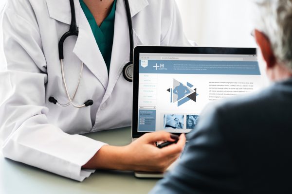 doctor talking with patient
