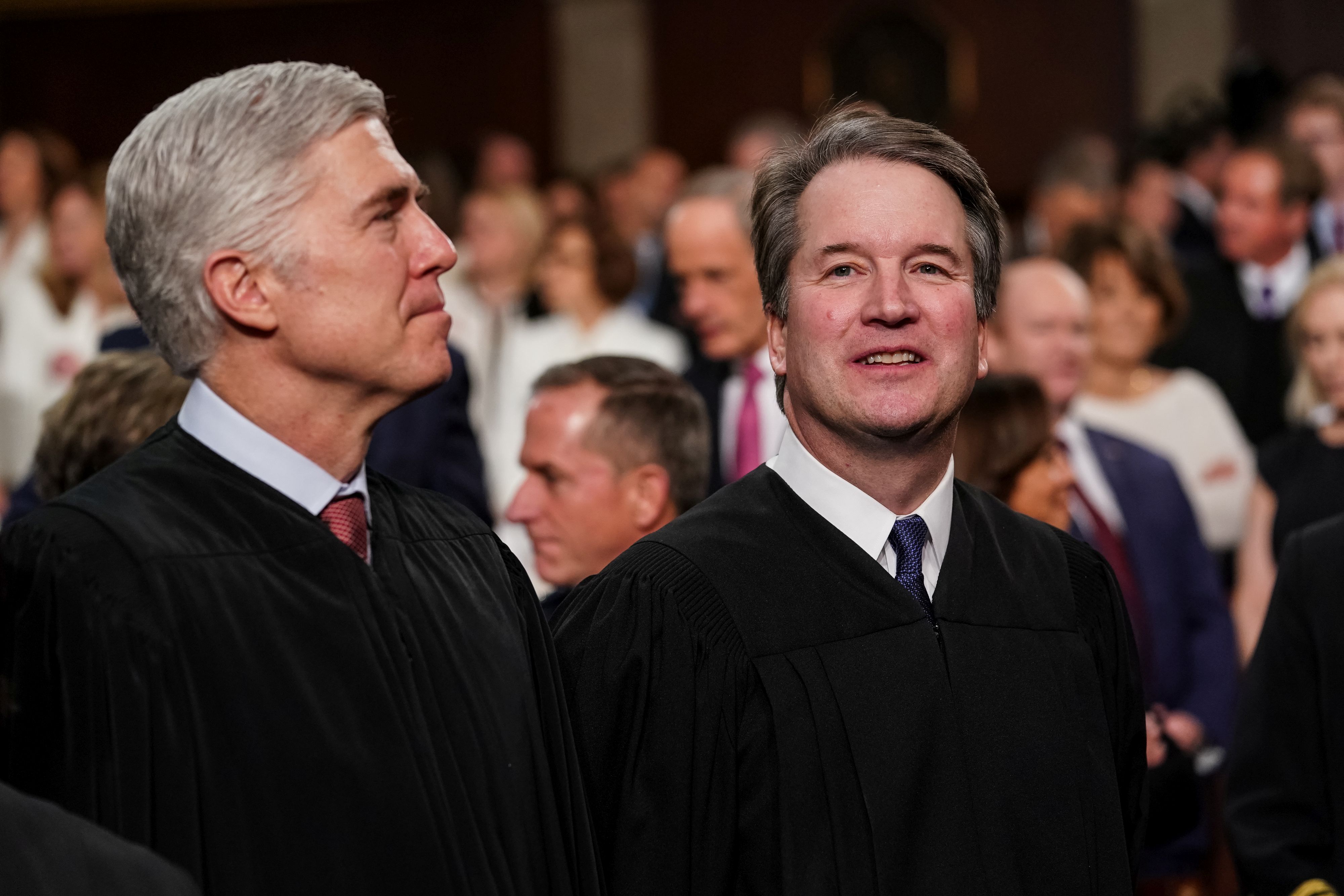 Supreme Court Justices Neil Gorsuch and Brett Kavanaugh attend the State of the Union address in the chamber of the U.S. House of Representatives at the U.S. Capitol Building