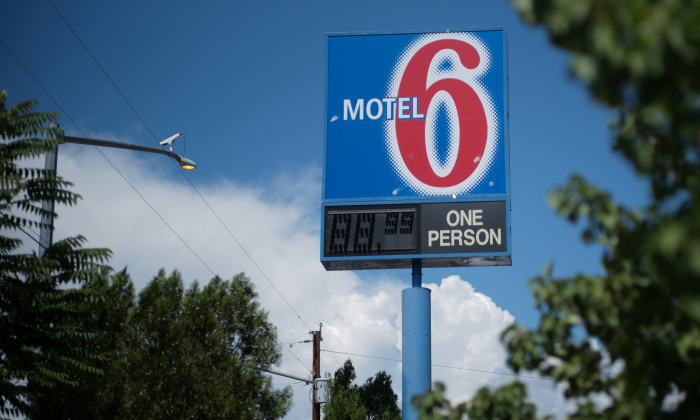 A sign marks a Motel 6 property on July 11, 2018, in Espanola, N.M. (Brian Snyder/Reuters)