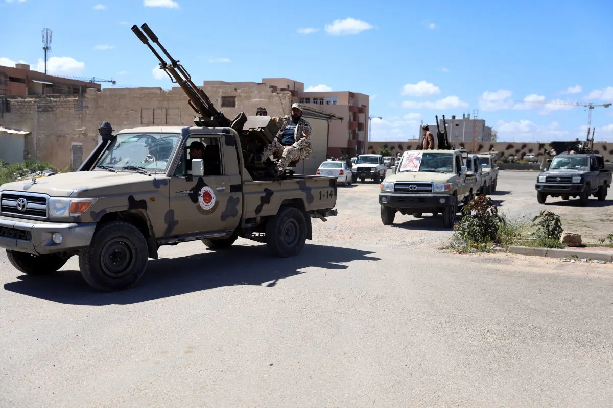 Members of Misrata forces, under the protection of Tripoli's forces, prepare themselves to go to the front line in Tripoli, Libya April 8, 2019. REUTERS/Hani Amara