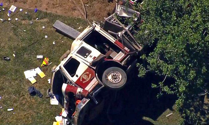 An aerial view of a Phoenix Fire Department truck that crashed into a pickup truck in Phoenix, Ariz., on April 7, 2019. (Courtesy of CNN/KTVK/KPHO)