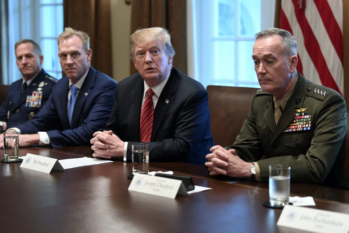 President Donald Trump, flanked by acting Defense Secretary Patrick Shanahan, second from left, and Chairman of the Joint Chiefs of Staff Gen. Joseph Dunford, right, speaks during a meeting with military leaders in the Cabinet Room of the White House in Washington, D.C. on April 3, 2019. At left is Air Force Chief of Staff Gen. David Goldfein. (Susan Walsh/AP)