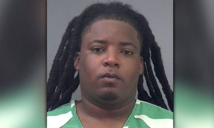 Ezekiel Hicks, 25, was arrested on murder charges in the death of 41-year-old Craig Brewer in Gainesville, Florida, on April 7, 2019. (Alachua County Sheriff’s Office)  