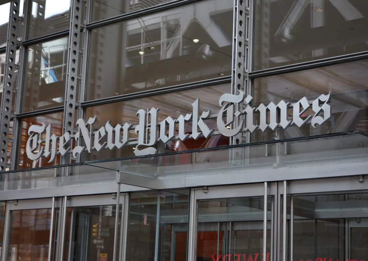 The sign over the west entrance of the New York Times building at 620 8th Ave. in New York on April 28, 2016. (DON EMMERT/AFP/Getty Images)