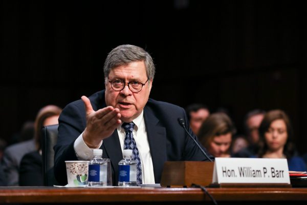 Attorney General nominee William Barr testifies on the first day of his confirmation hearing