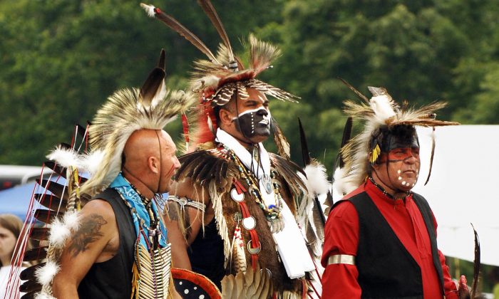 Cherokee people in a historical and cultural celebration of Native American heritage. (STAN HONDA/AFP/Getty Images)