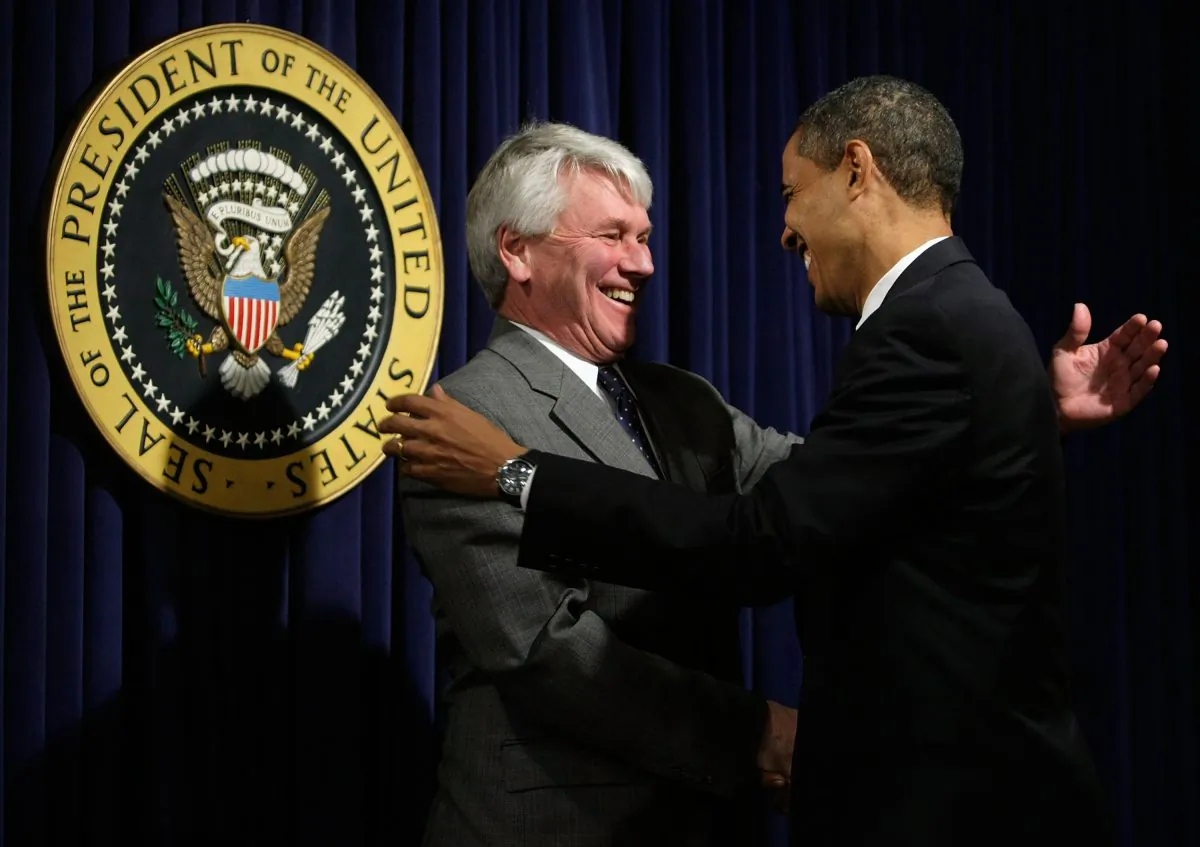 President Barack Obama (R) greets White House counsel Gregory Craig during an event at the Eisenhower Executive Office Building of the White House Jan. 21, 2009. (Alex Wong/Getty Images)
