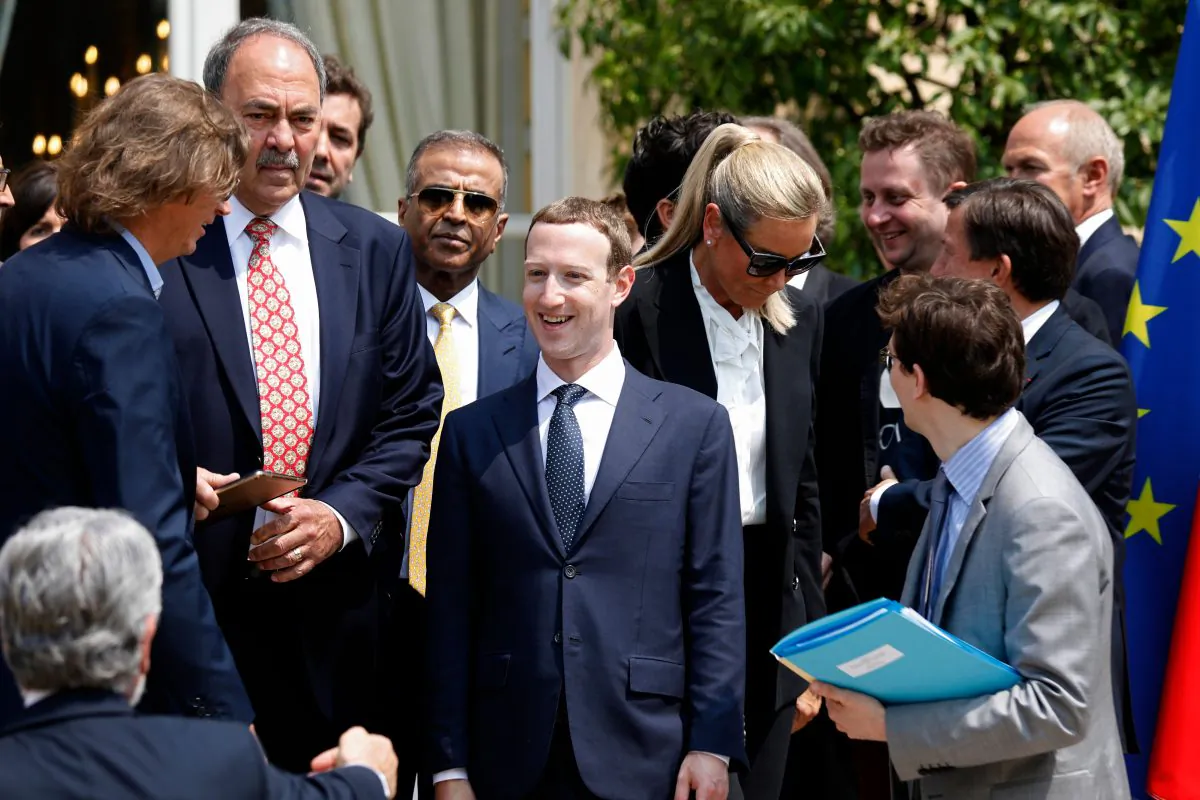 Facebook's CEO Mark Zuckerberg (C) arrives for a family picture with guests of the "Tech for Good" Summit at the Elysee Palace in Paris, on May 23, 2018. CHARLES PLATIAU/AFP/Getty Images